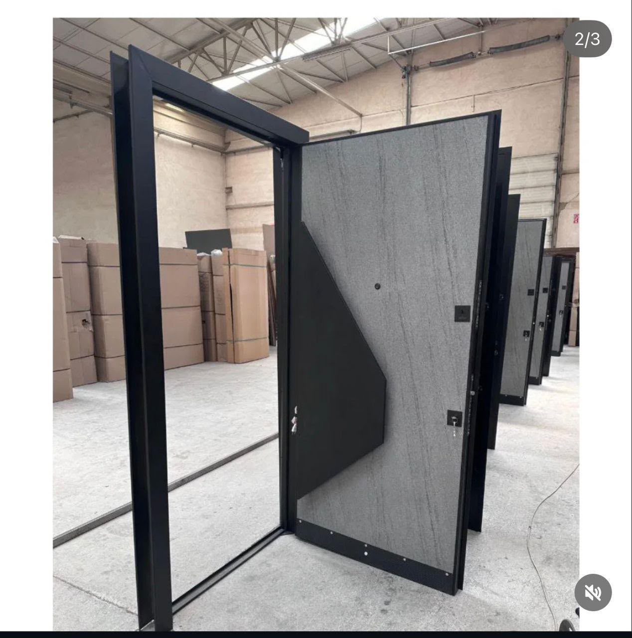 Sculpted Stone Pivot Door — Doors